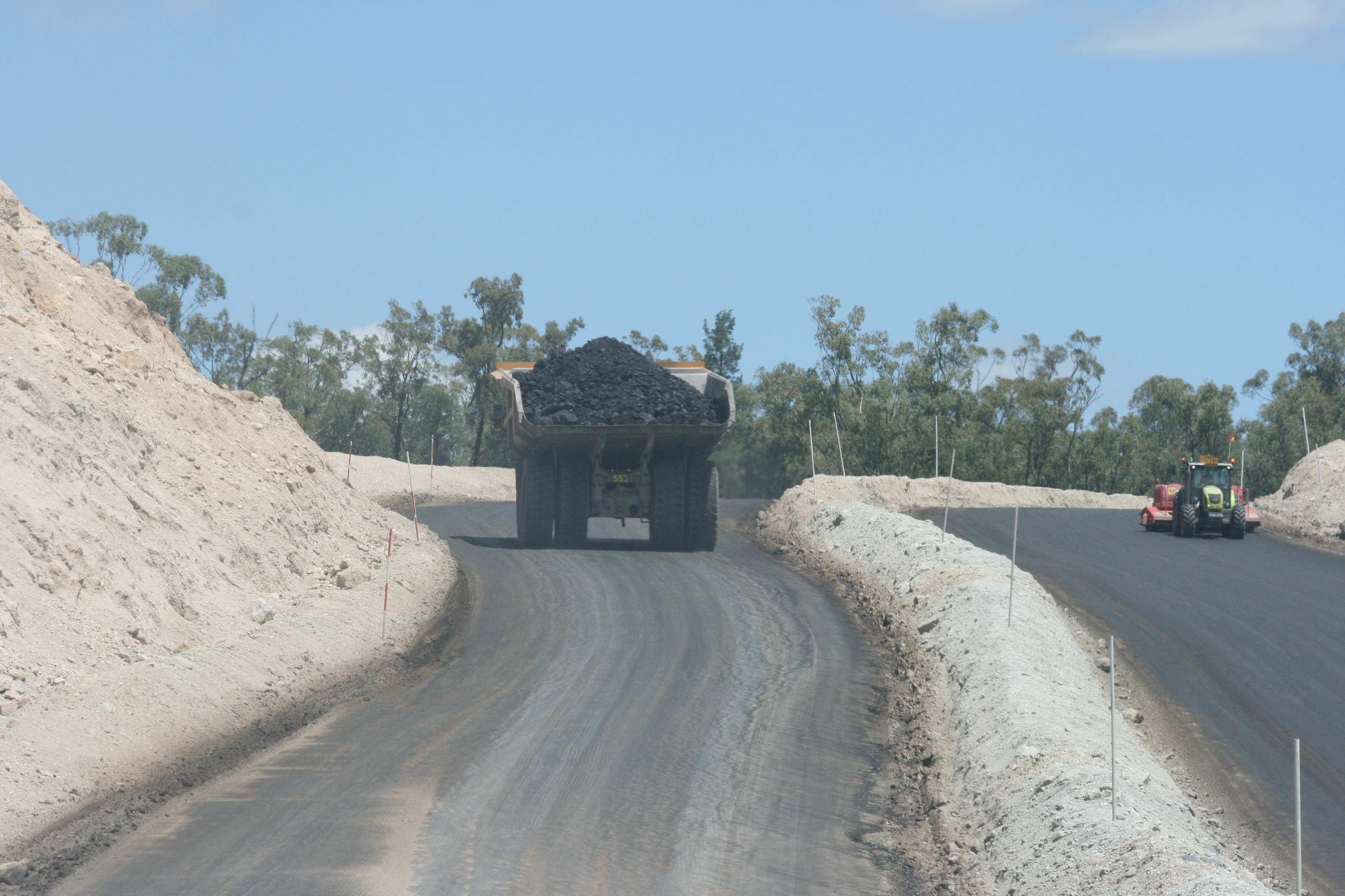 How can mines increase production by making haul roads work more efficiently?